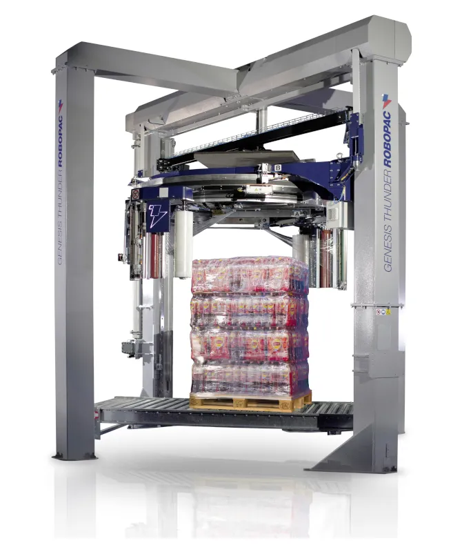 A Robopac Genesis Thunder rotary ring wrapper with a pallet of bottled water inside the frame.